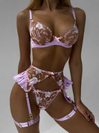 Ensemble de lingerie sexy brodée quatre pièces, string et tanga.
